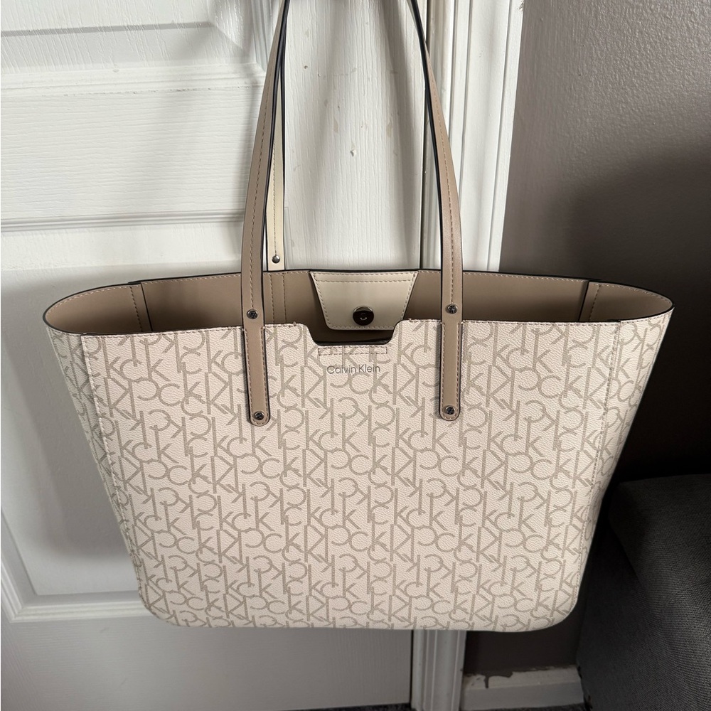 Calvin Klein Cream Monogram Tote with Structured Design